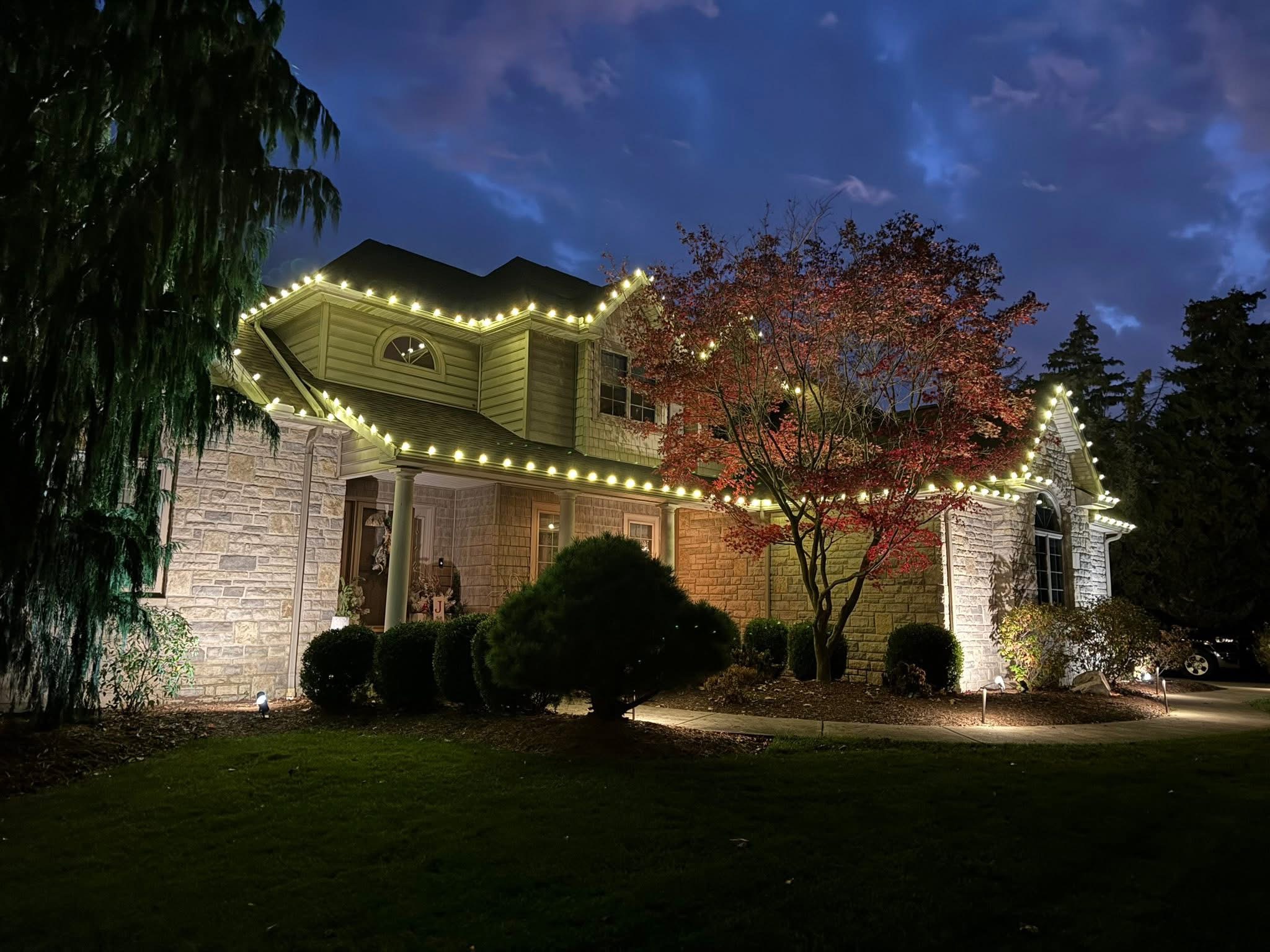 Warm white seasonal Christmas roofline lighting